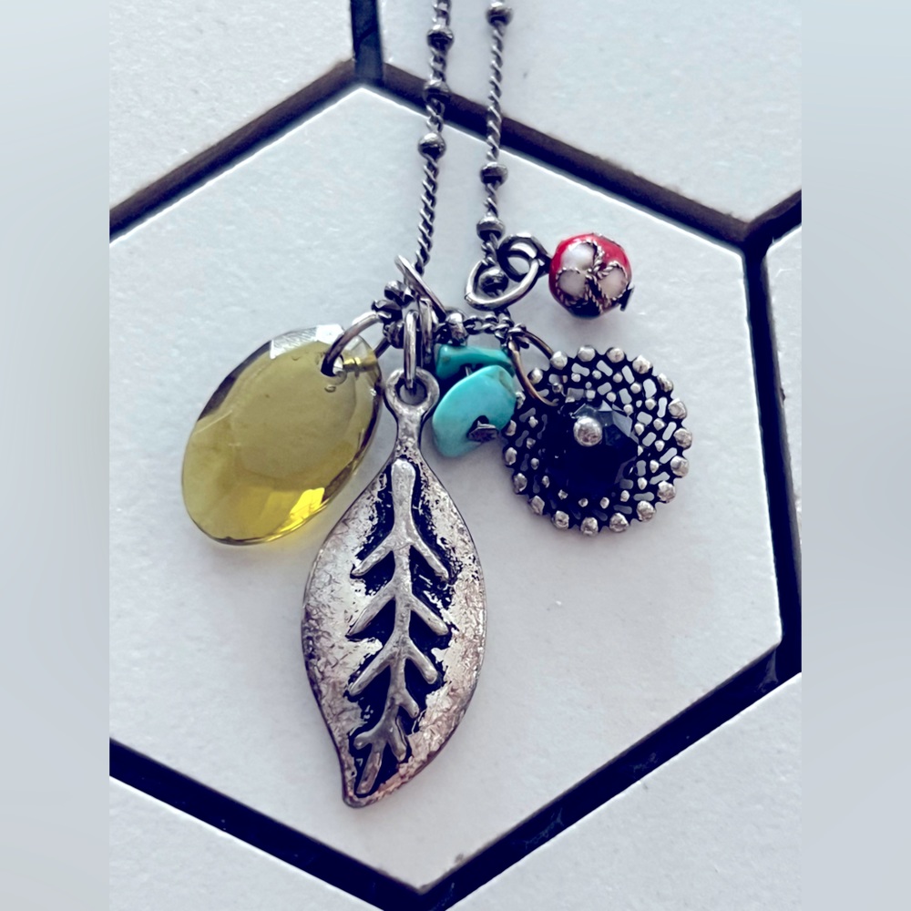 Sterling silver necklace muti charms. Semi precious stone & turquoise beads.
